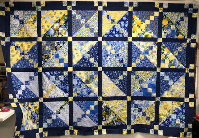 yellow and blue quilt